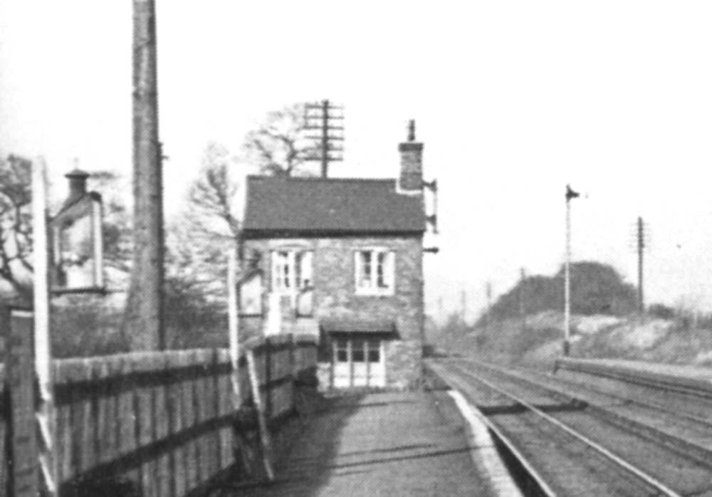 Close up showing the stationmaster's house which forms the end of the up platform
