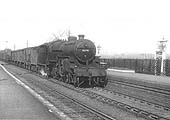 Ex-LMS 2-6-0 No 42791 at the head of a Class 'D' express freight train passing through the station on 8th March 1956