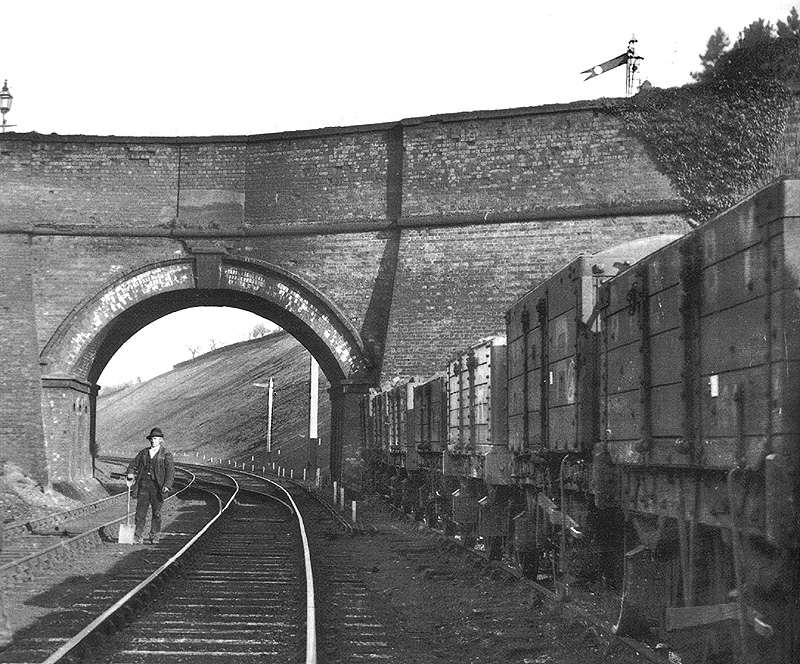 Looking north towards Moseley of the original Queen's bridge shortly before demolition with the Ballast Pit sidings on the left
