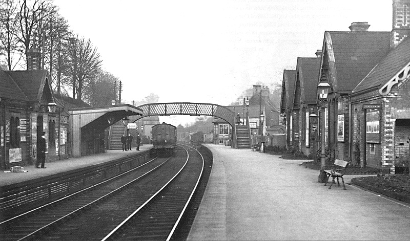 View of the station as a local passenger service is seen departing from the up platform for Birmingham New Street via the Camp Hill line
