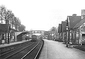 View of the station as a local passenger service is seen departing from the up platform for New Street