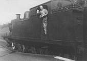 Ex-LT&SR 2P 4-4-2T No 2107 is seen at Kings Heath at the head of a down local passenger service in 1935
