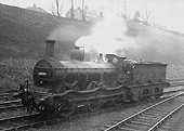 Ex-Midland Railway outside curved frame 0-6-0 No 22630 is seen running light engine through Kings Heath