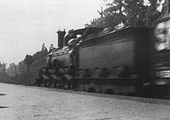 An unidentified MR 0-6-0 Class 700 is seen passing through Kings Heath station on a down goods train in 1928