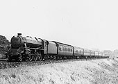 LMS Stanier 4-6-0 "Black 5" No 5299 climbs the banks with an express
