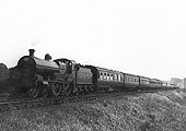Ex-MR 4-4-0 "Compound" No 1013 at the head of an express near Kings Norton