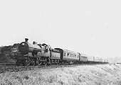 Ex-MR 4-4-0 No 511 heads an eight coach excursion express