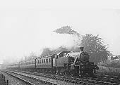 LMS Stanier 2-6-2T No 92 is seen on a local passenger train