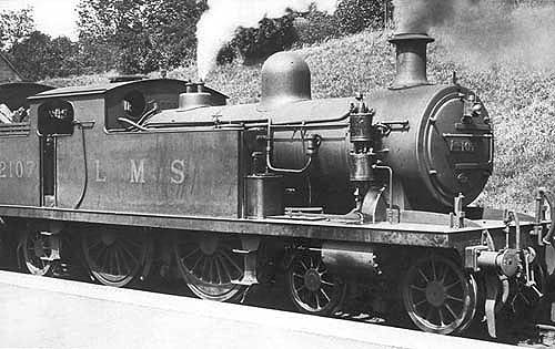 Ex-LTSR 2P 4-4-2T 'Tilbury Tank' No 2107 'Earls Court' stands at the head of a Redditch train
