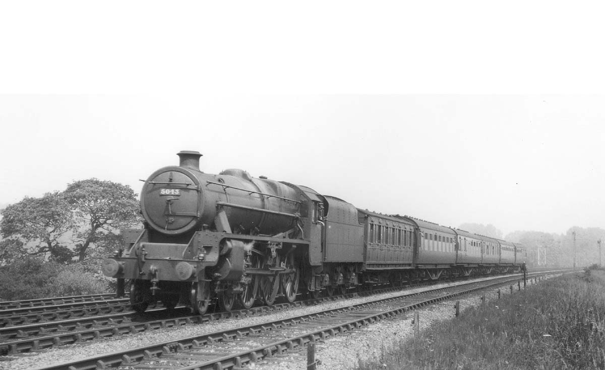 LMS 4-6-0 5MT No 5013 is seen at the head of a short express service near Kings Norton in 1937