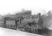 Ex-MR outside framed 2-4-0 No 1 is seen on a local passenger train to Birmingham New Street