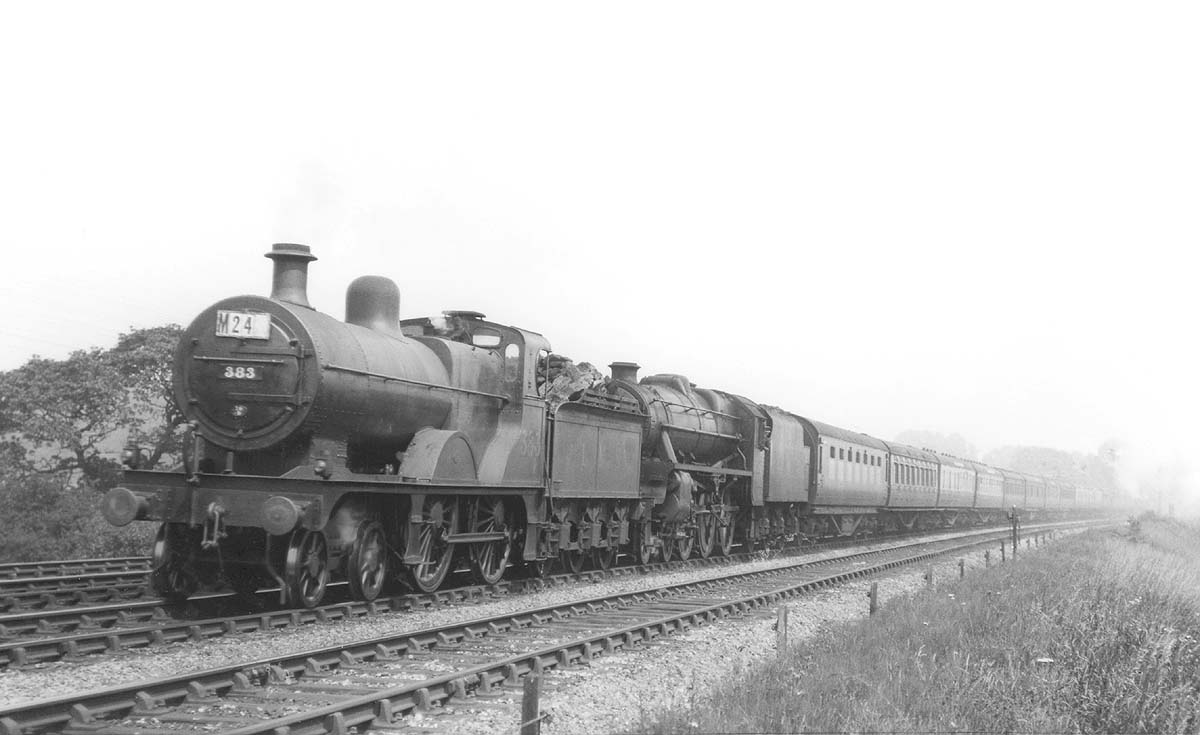 Ex-MR 2P 4-4-0 No 383 doubleheads LMS 5MT 4-6-0 No 5288 on an up express south of Kings Norton