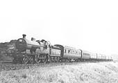 Ex-MR 4-4-0 No 511 heads an eight coach excursion express