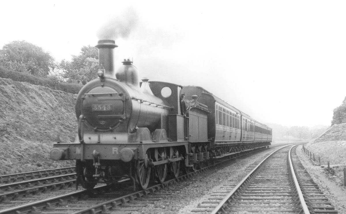 MR 0-6-0 2F No 3543 is seen working a local passenger train comprising close coupled carriage stock on 1st August 1921
