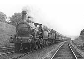 MR Kirtley 1P 2-4-0 No 24 pilots MR 4-4-0 No 778 on a down express south of Kings Norton