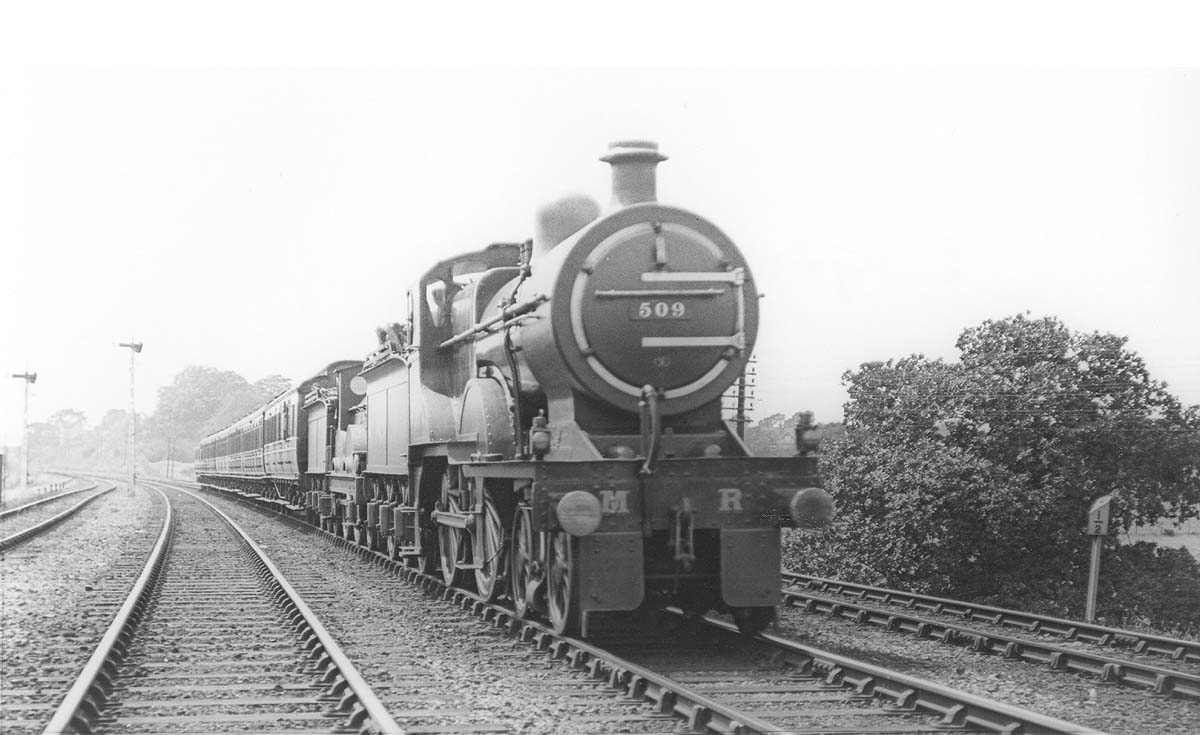 MR 4-4-0 No 509 doubleheads MR 4-4-0 No 126 on an up express train south of Kings Norton on 16th July 1921