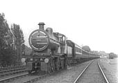 MR 4-4-0 No 405 works an express train south of Kings Norton