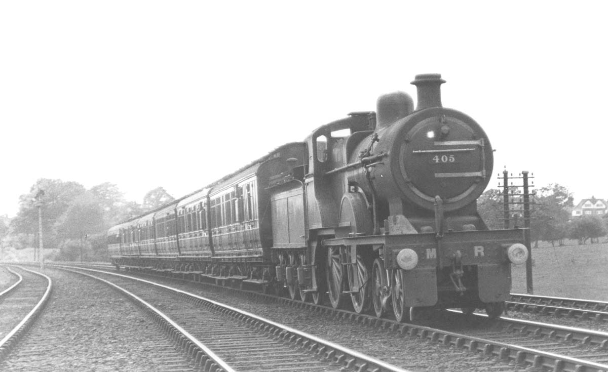 Having worked an earlier southbound train MR 4-4-0 No 405 is seen later in the day on a return working