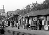 Close up showing the up platform's passenger facilities which by 1920 had gained a newsagents stall