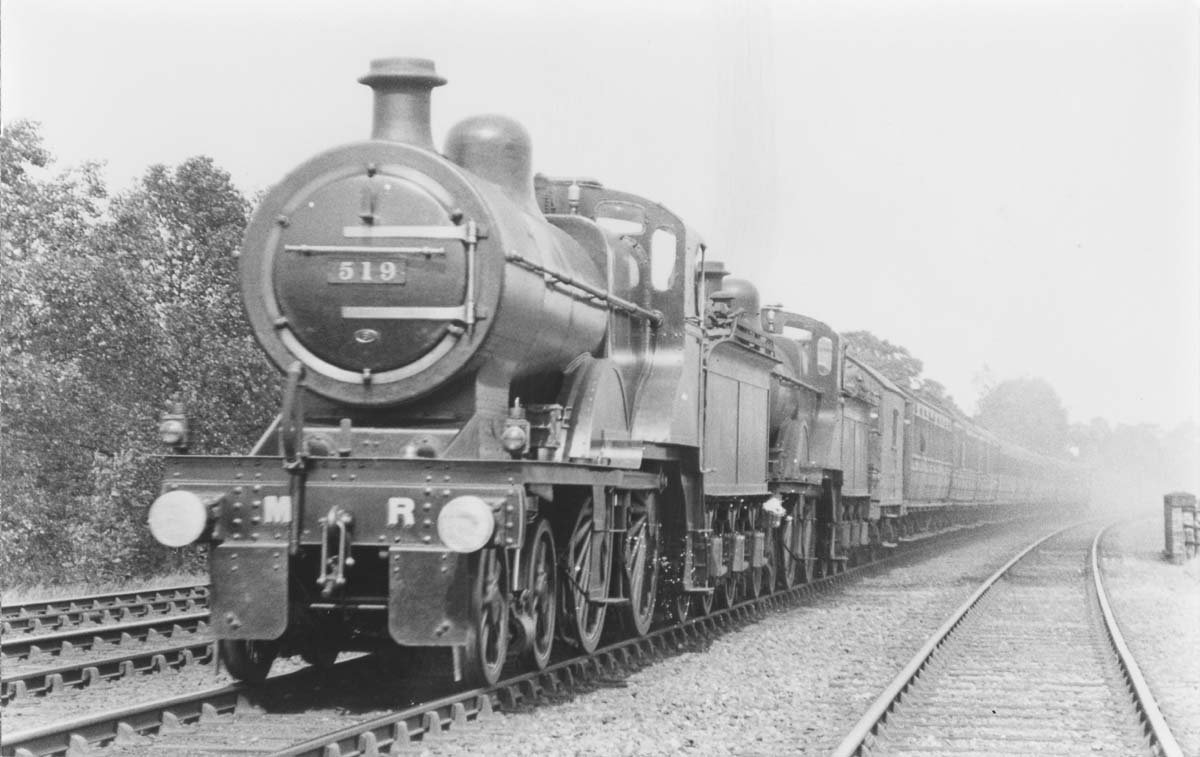 MR 4-4-0 2P No 519 double heads an unidentified MR 4-4-0 on a down express passenger service