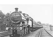 MR 4-4-0 No 523 carrying its No 3 Saltley shed plate on a down express train