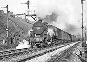 Ex-LMS 5MT 2-6-0 'Crab' No 42823 is seen on a passing express freight on 21st December 1963