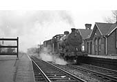 Ex-LMS 4F 0-6-0 No 44571 runs through Kings Norton Station with a Brake Van in tow on the way to the goods yard to pick up a goods working