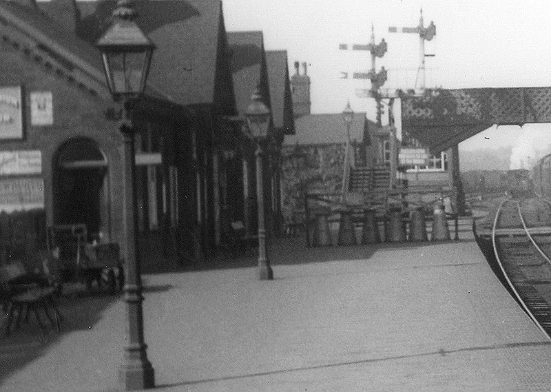 Close up showing the Northfield end of the down platform which has had a timber open framed barrier erected