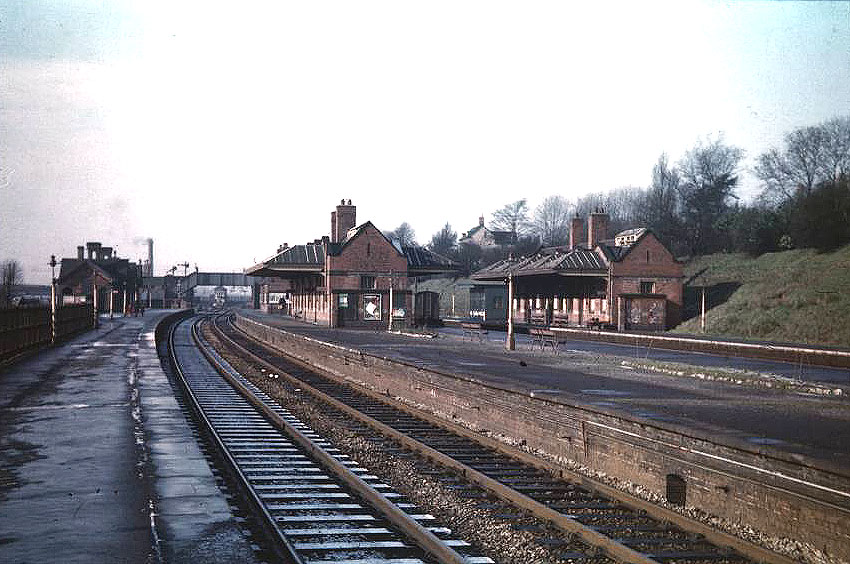 Looking towards Northfield with the goods yard and its signal box in the distance under Station Road footbridge