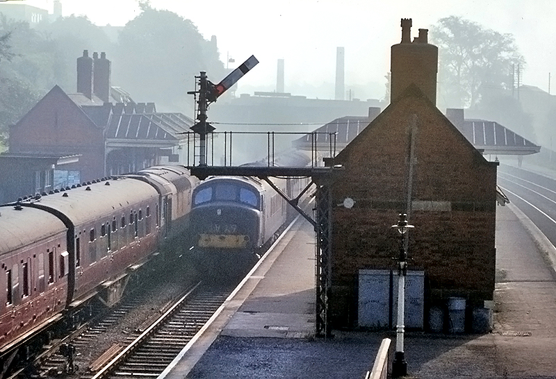 An unidentified 'Peak' in early British Railways livery runs through Kings Norton station early one morning