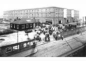 A posed photo taken on 11th July 1910 of the Landor Street entrance to the goods shed and a variety of road vehicles