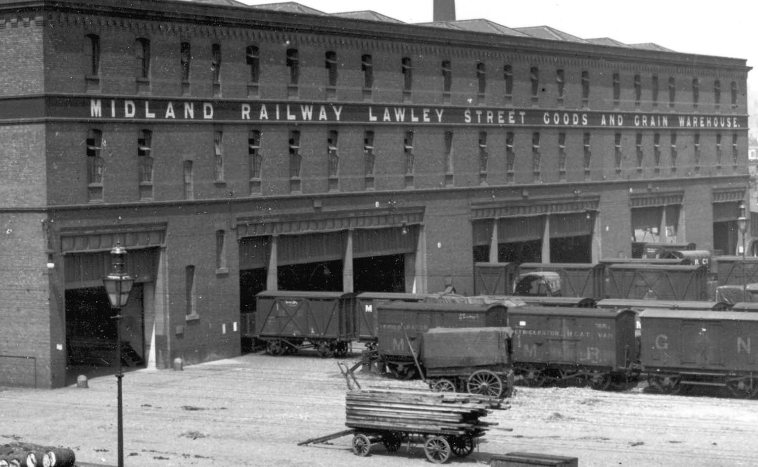 Close up showing the entrances provided for railway traffic at Lawley Street Goods and Grain Warehouse and a variety of ventilated vans