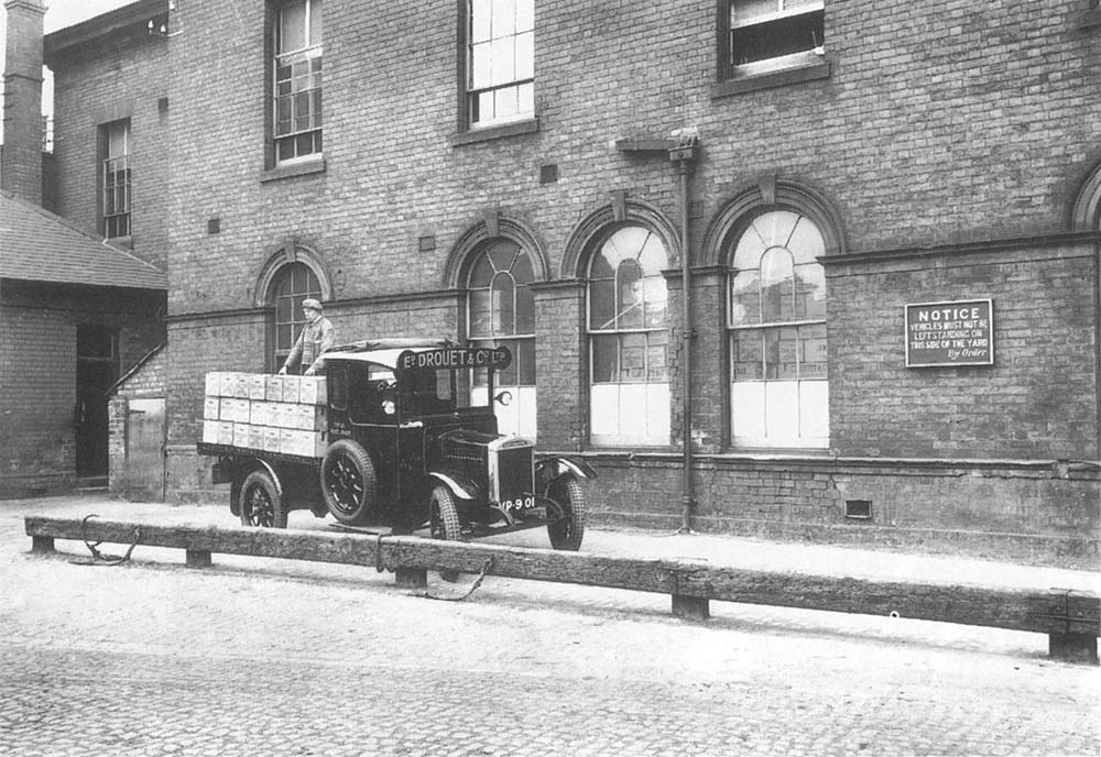 The outside of Lawley Street's Banana Depot with Edward Drouet & Company Limited's lorry in evidence on 21st June 1929