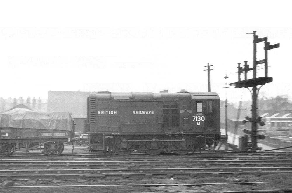 Ex-LMS 0-6-0 Diesel Shunter M7130 is seen at the end of a shunting neck opposite Saltley shed on 21st March 1948