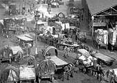 Close up showing the yard adjacent to the 'Empties' shed with a horse drawn dray standing on a weighbridge