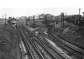 Looking towards Kings Norton with Lifford Station signal box on the left and Lifford Curve on the right on 29th July 1957