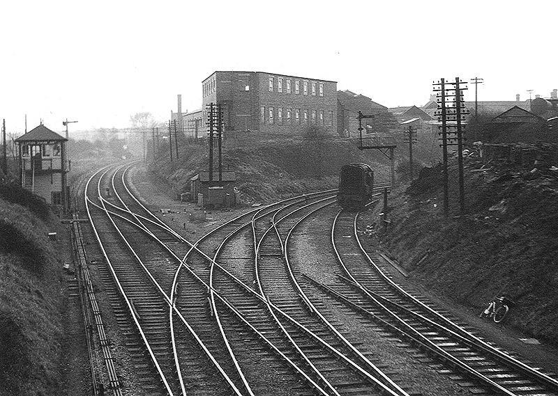 Another view of Lifford Station Junction signal box showing an 0-6-0 Diesel shunter being held by signals on 18th February 1961