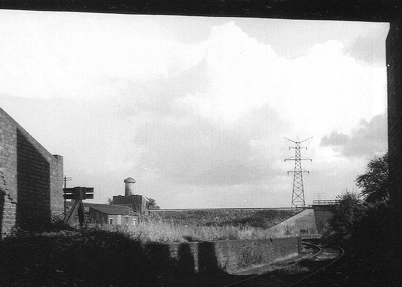 View of the canal branch line taken from beneath Pershore Road bridge with the B&GR Camp Hill to Kings Norton line in the distance