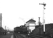 Ex-MR 0-6-0 2F No 58138 is seen leaving Lifford goods yard with two LMS guard vans behind its tender in 1961