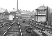 Longbridge West Signal Box on the right with the station in the distance on 12th March 1962
