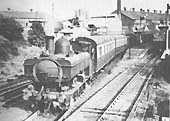 GWR 0-6-0PT  No 1835 is seen leaving Longbridge station with a GWR Workman�s train for Old Hill circa 1946