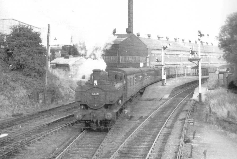 British Railways 0-6-0PT 64xx class No 7448 leaves Longbridge station in the late 1950s