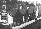 Close up showing Moseley Station's main passenger facilities on the up platform and the footpath