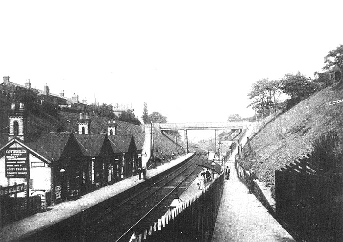 Looking along the public footpath towards New Street with Woodbridge Road bridge in the distance