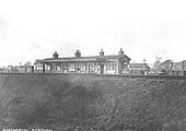 An Edwardian Postcard of a distant view of Northfield Station as seen from the adjacent fields
