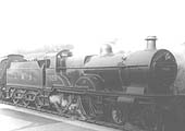 Ex-MR 4P 4-4-0 Compound No 1025 stands at the head of a local passenger train on 10th March 1932
