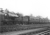 Ex-LNWR 4-4-0 George Fifth class No 5327 'E Nettlefold' heads a Bournville excursion train on 9th April 1930