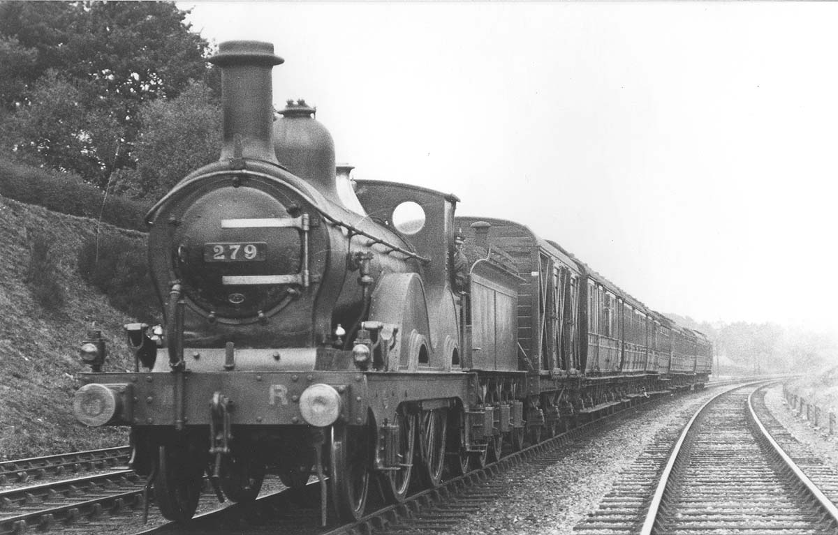 MR 2-4-0 No 279 on a six coach train with a six-wheel fitted van behind the tender