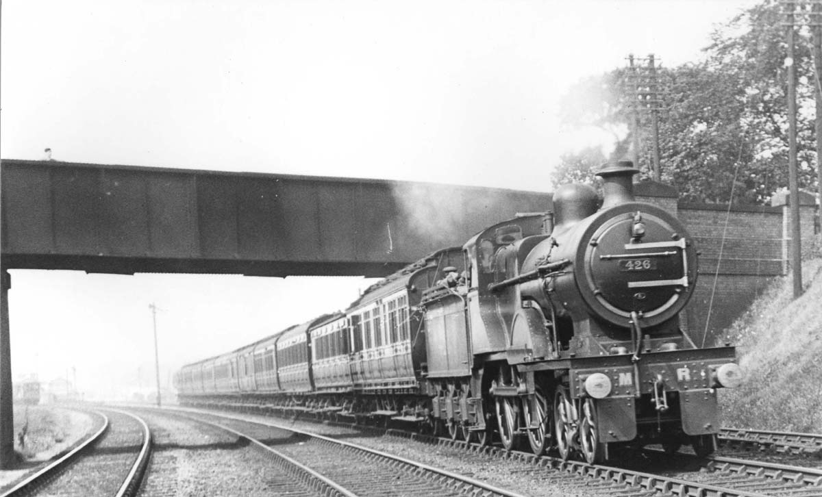 MR 2P 4-4-0 No 426 is seen working hard on an express passenger service near Northfield circa 1921
