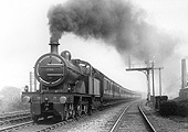 MR 4-4-0 No 766 is seen working hard as it heads an express passenger service in August 1921